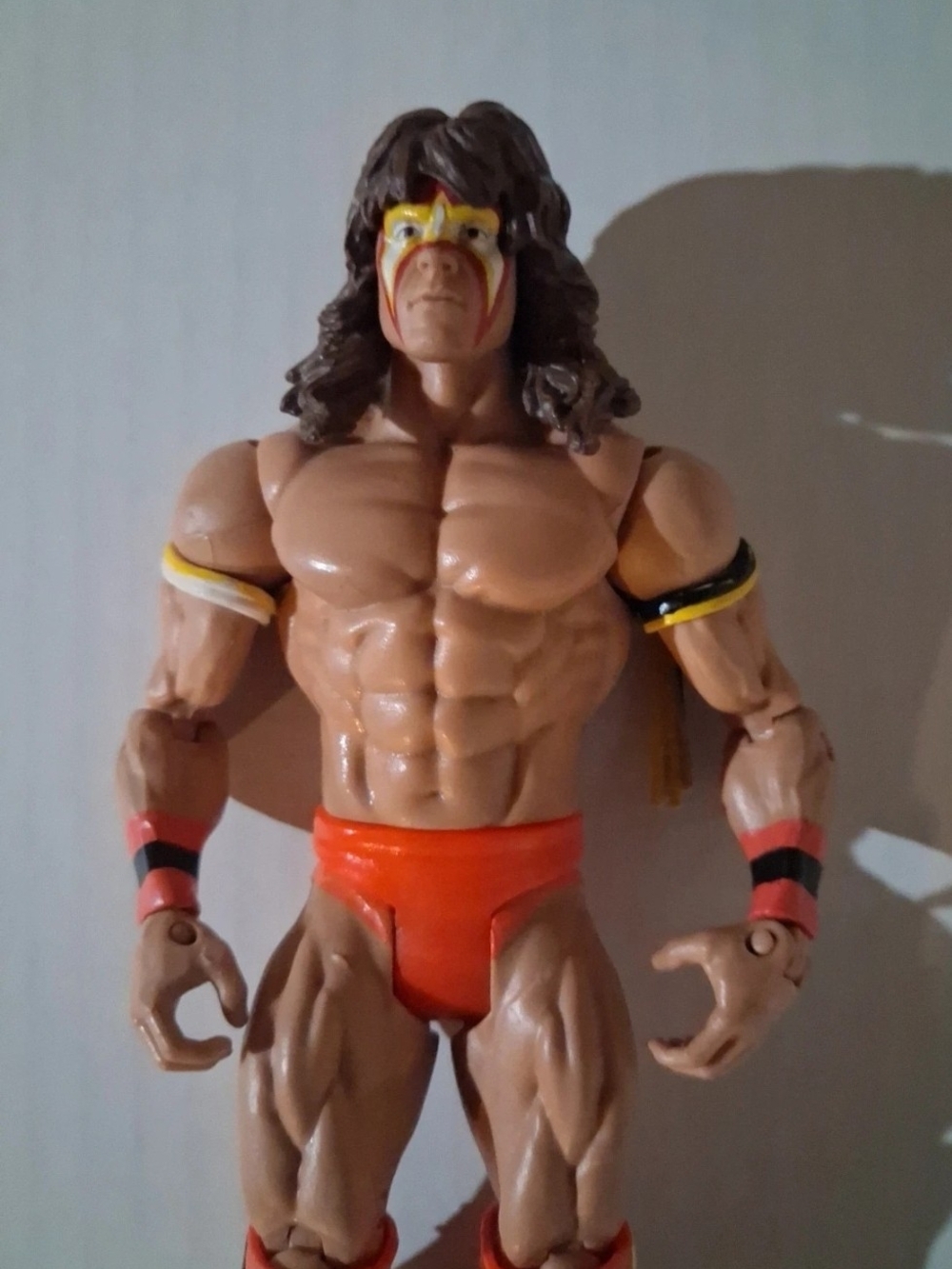 Wrestler Action Figure  with Red Trunks and Face Paint